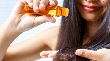 Stop hair fall with this DIY coconut and castor oil serum | HealthShots