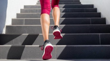 Climb the stairs to move more.