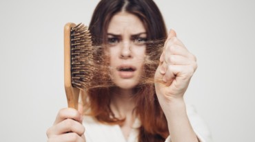 4 disastrous things that happen when you wash your hair with hot water |  HealthShots